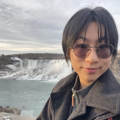 Portrait of Audrey Choi at Niagara Falls in winter.