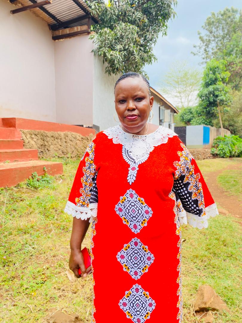 Portrait of Dorothea Machui outdoors.