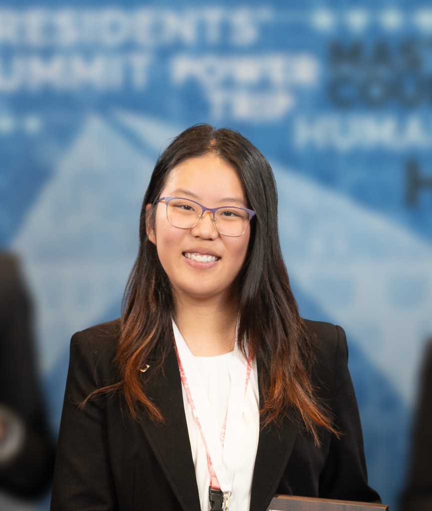 Portrait of Pam Liu at a professional event.